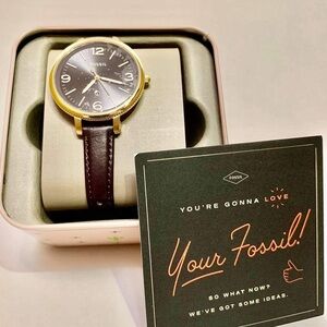 NEW Fossil women’s three hand watch and date indicator. Brown leather band.